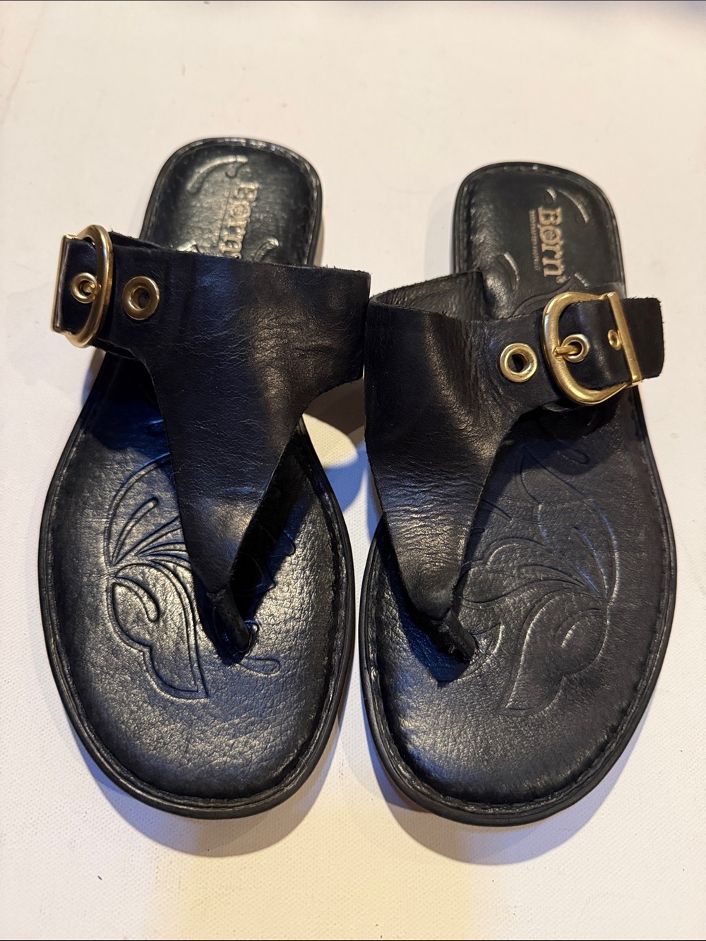Born Black Leather Toe-Post Sandals with Gold Buckle Detail